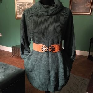 Over sized turtle neck sweater with pockets.